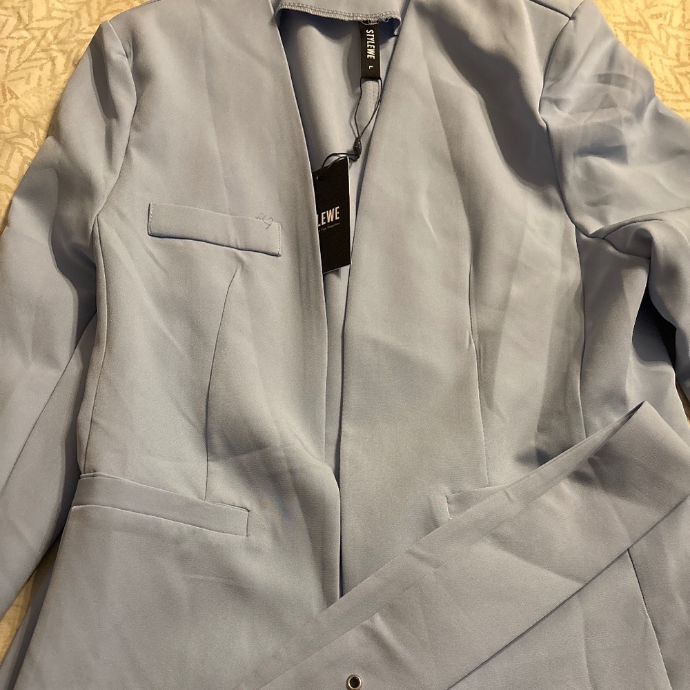 Light blue 2 piece suit ( brand new with tags)